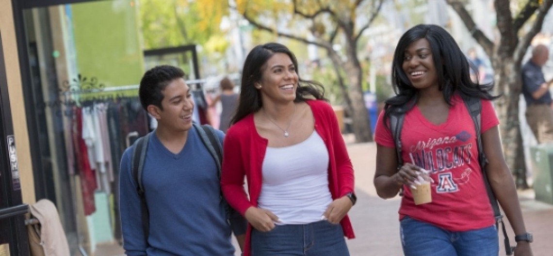 Students walking through campus together